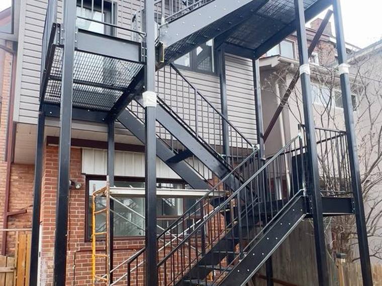 Multi-level industrial steel platform and stair.