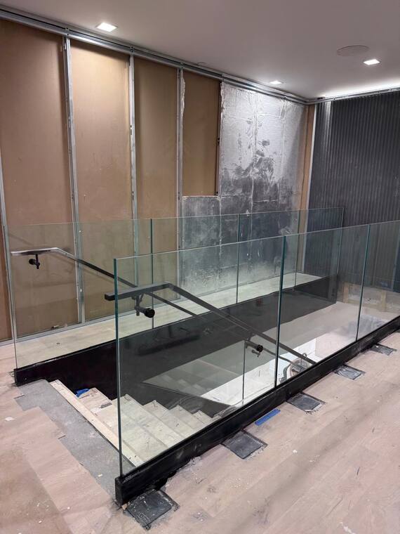 Glass guard running along a landing.